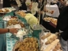 Beautiful buffet with treats like lemon raspberry Danish, chocolate croissants and coffee cakes.